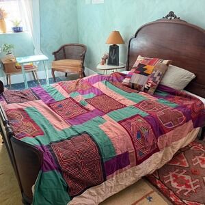 Patchwork mola panel duvet cover made with hand-sewn Panamanian textiles